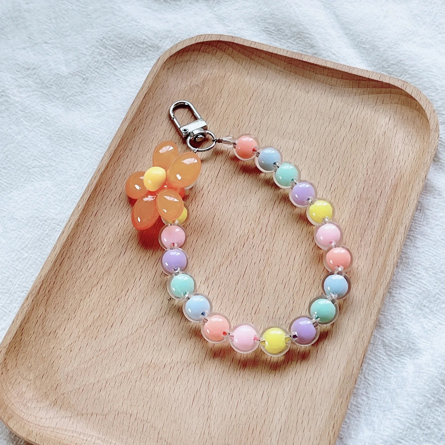 Colored bead petal Lanyard for IPhone Anti-Lost Bracelet for Samsung Mobile Phone Case Wrist Strap Car Keychain Cute Phone Charm